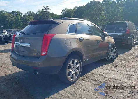 2015 Cadillac Srx Premium Collection z USA, uszkodzony, nr VIN 3GYFNDE36FS557383